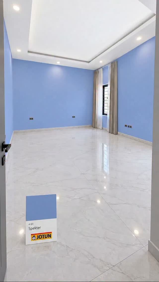 Floor and Wall Color Combinations: 27 Rooms That Get It Right 23 Light blue walls meet polished white marble floors in a bright, empty room.
