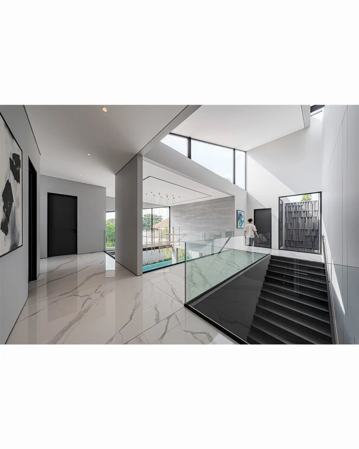 Floor and Wall Color Combinations: 27 Rooms That Get It Right 20 White marble floors meet minimalist white walls in a modern, high-ceilinged architectural interior.