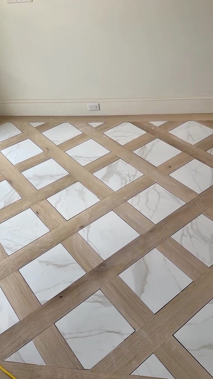Wood Tile Pattern: 6 Layouts That Actually Work 5 Geometric floor pattern with light wood strips and white marble diamond tiles.